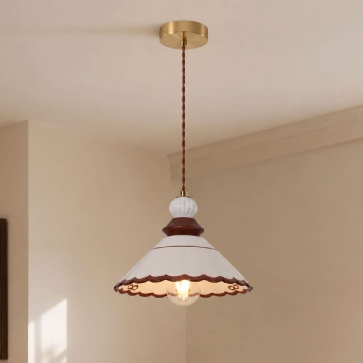 brown ceramic lace pendant light shown as a clean product view