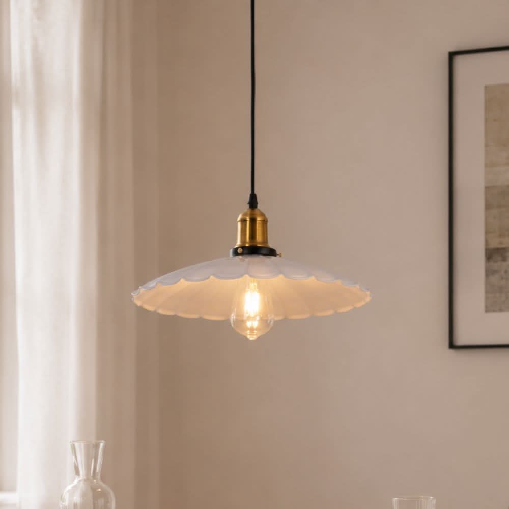 white iron pendant light shown as a clean product view