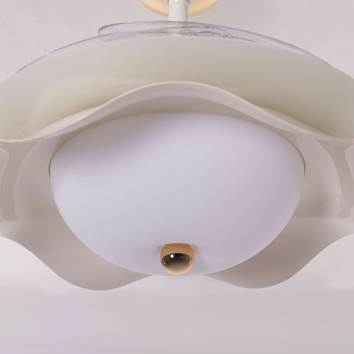 42 inch reversible ceiling fan with LED light cooling a bright bedroom
