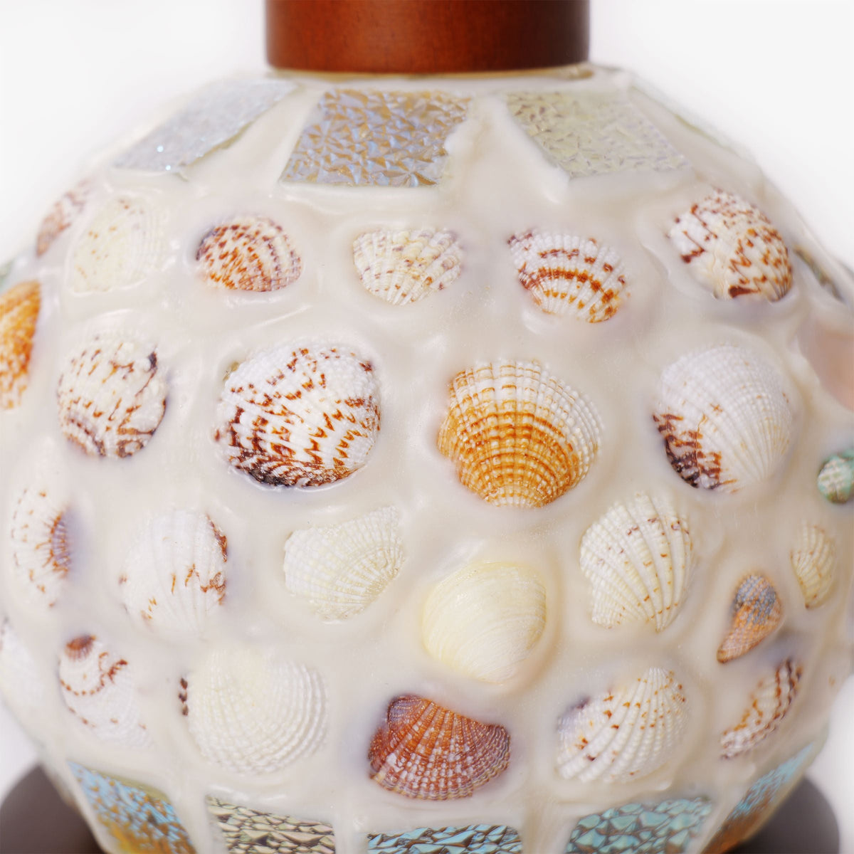 seashell mosaic table lamp with a warm diffused glow