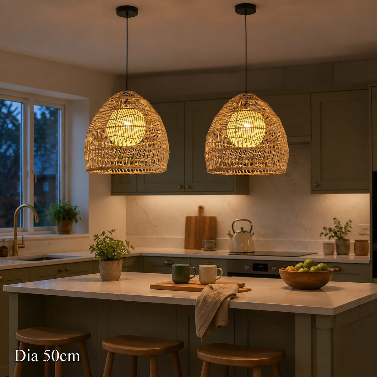 Pair of rattan pendant lights with inner spheres above a kitchen island