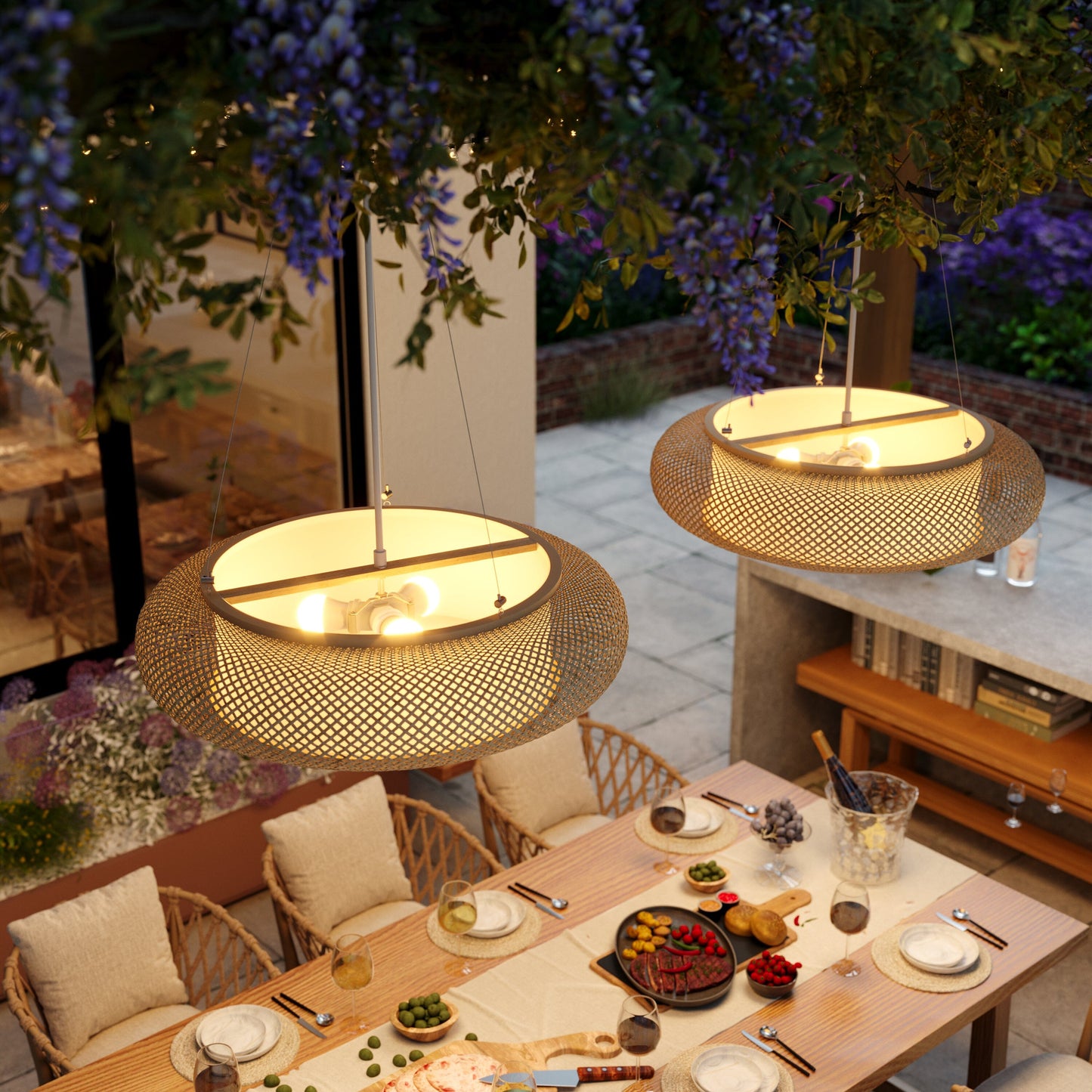 overhead bamboo pendant lights above an outdoor dining table