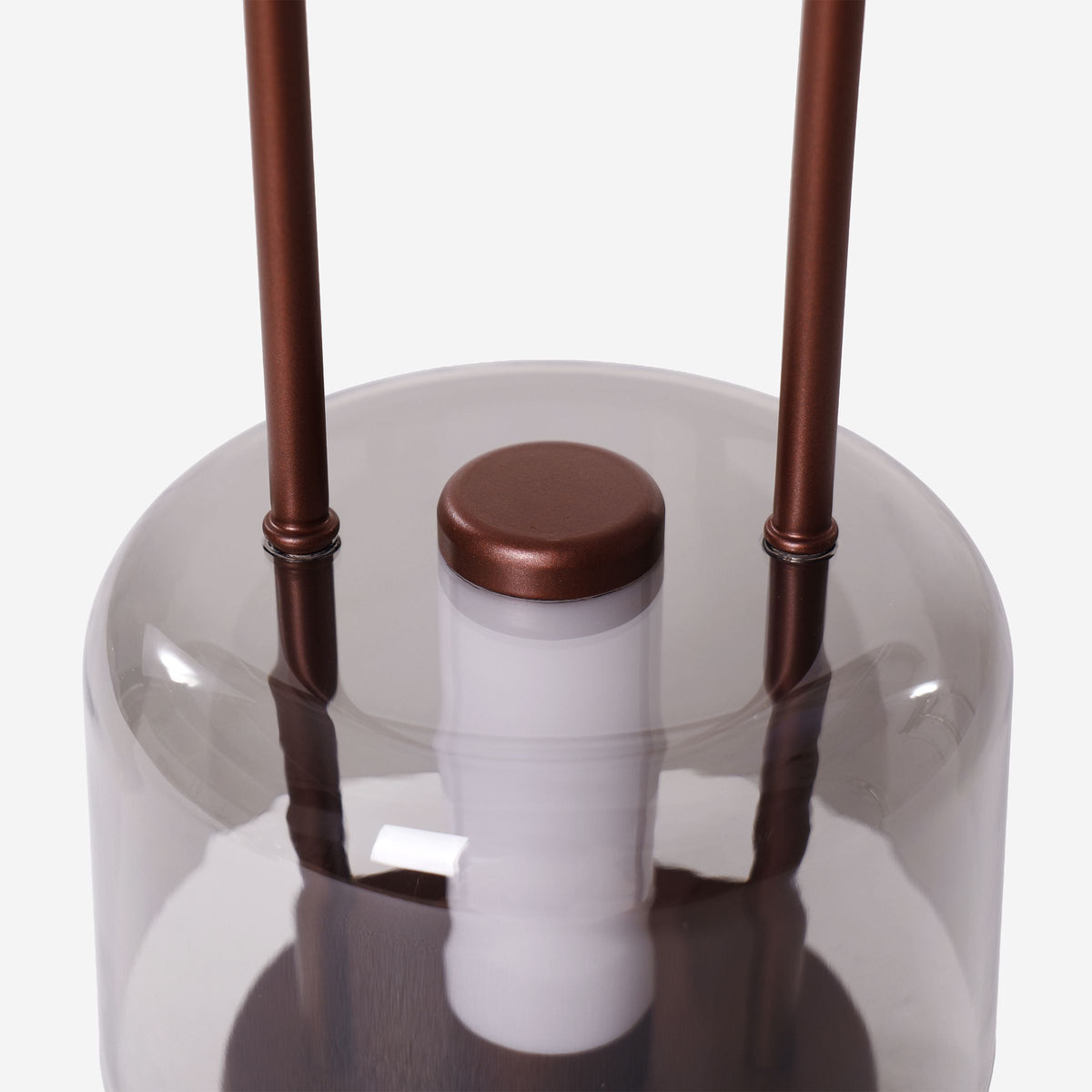 portable lantern-style ambient table lamp styled on a small side table