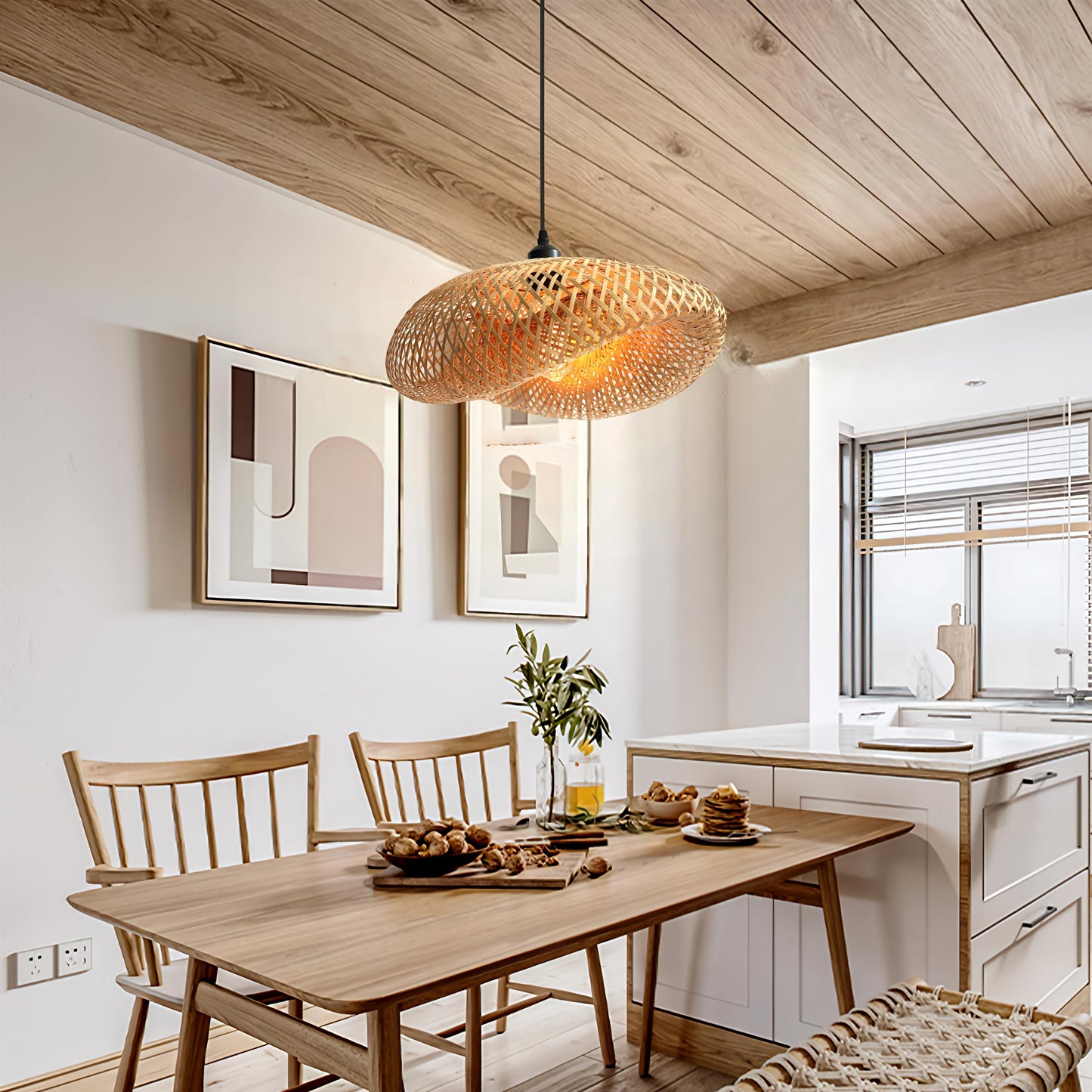 woven bamboo pendant light above a dining table beside the kitchen