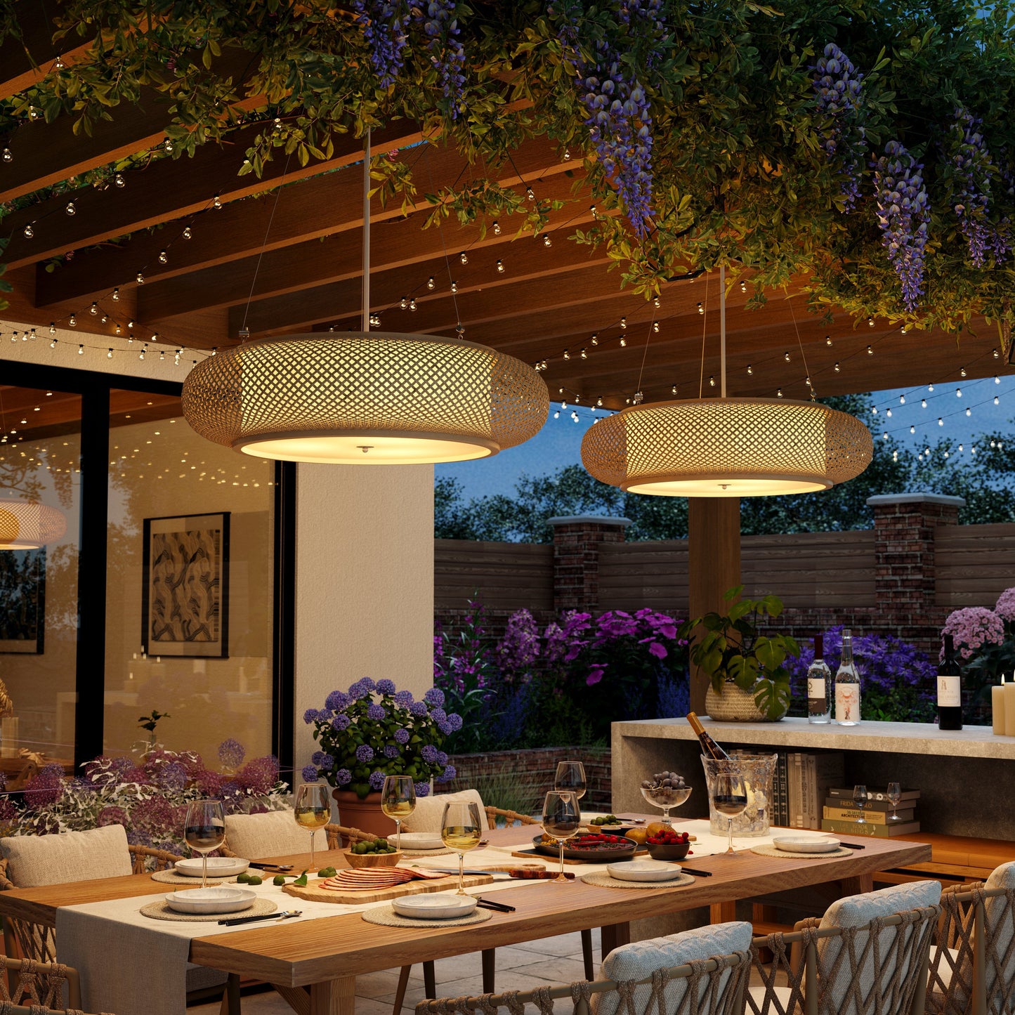 pair of bamboo pendant lights over an evening patio table
