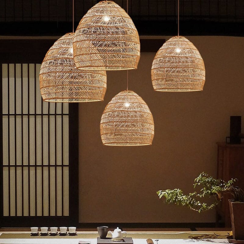 Cluster of natural rattan pendant lights in a warm dining room