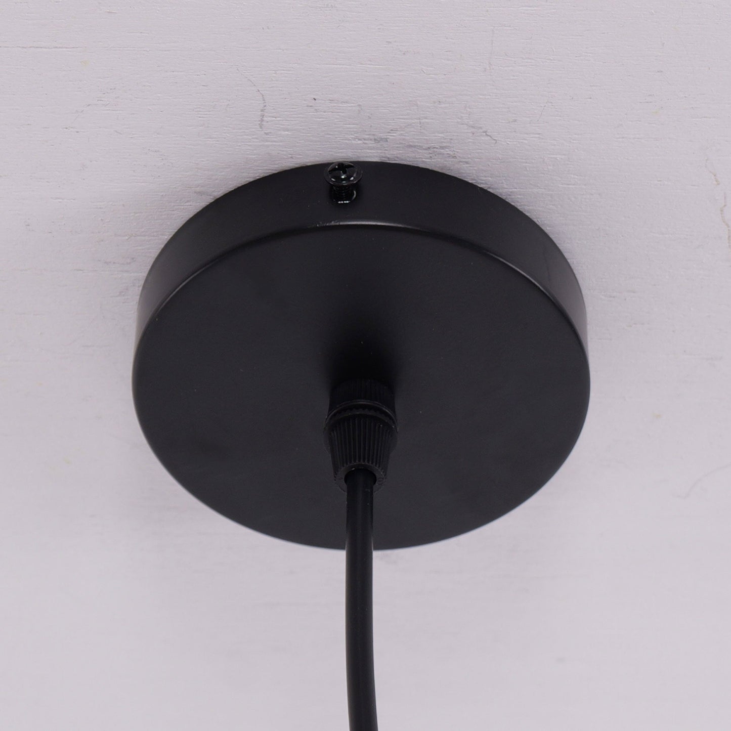 black ceiling plate and cord detail for bamboo pendant light