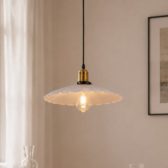 white iron pendant light shown as a clean product view