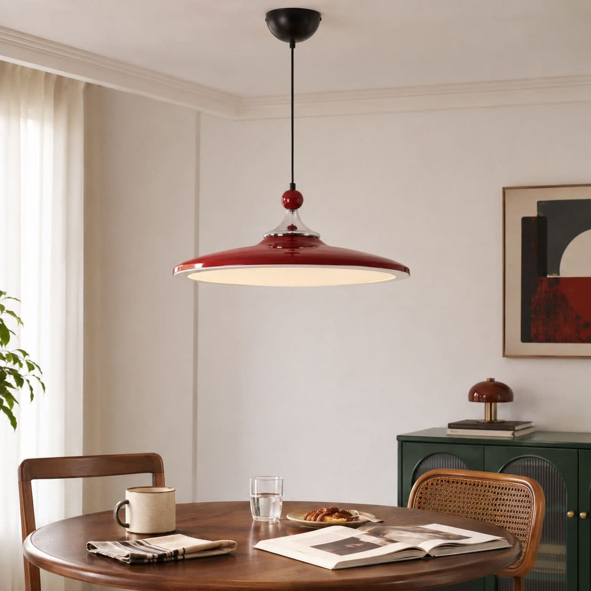 red iron pendant light shown as a clean product view