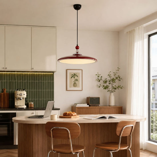 red iron pendant light beside a cosy seating area