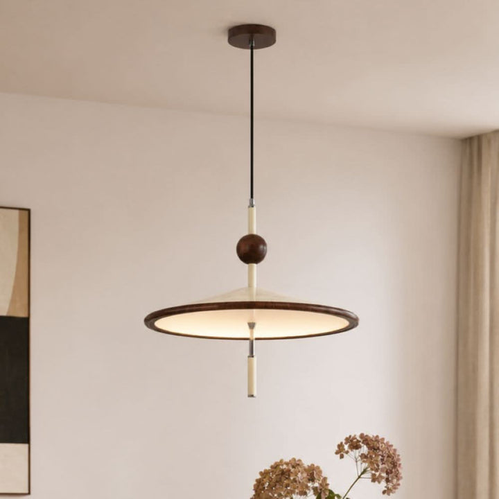 beige iron pendant light shown as a clean product view