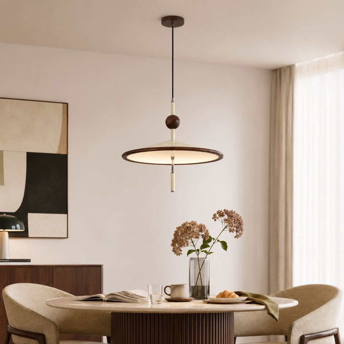 beige iron pendant light styled in a calm bedroom
