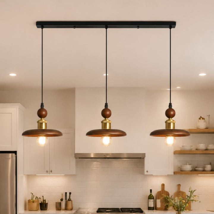 3-light walnut wood mini pendant shown as a clean product view