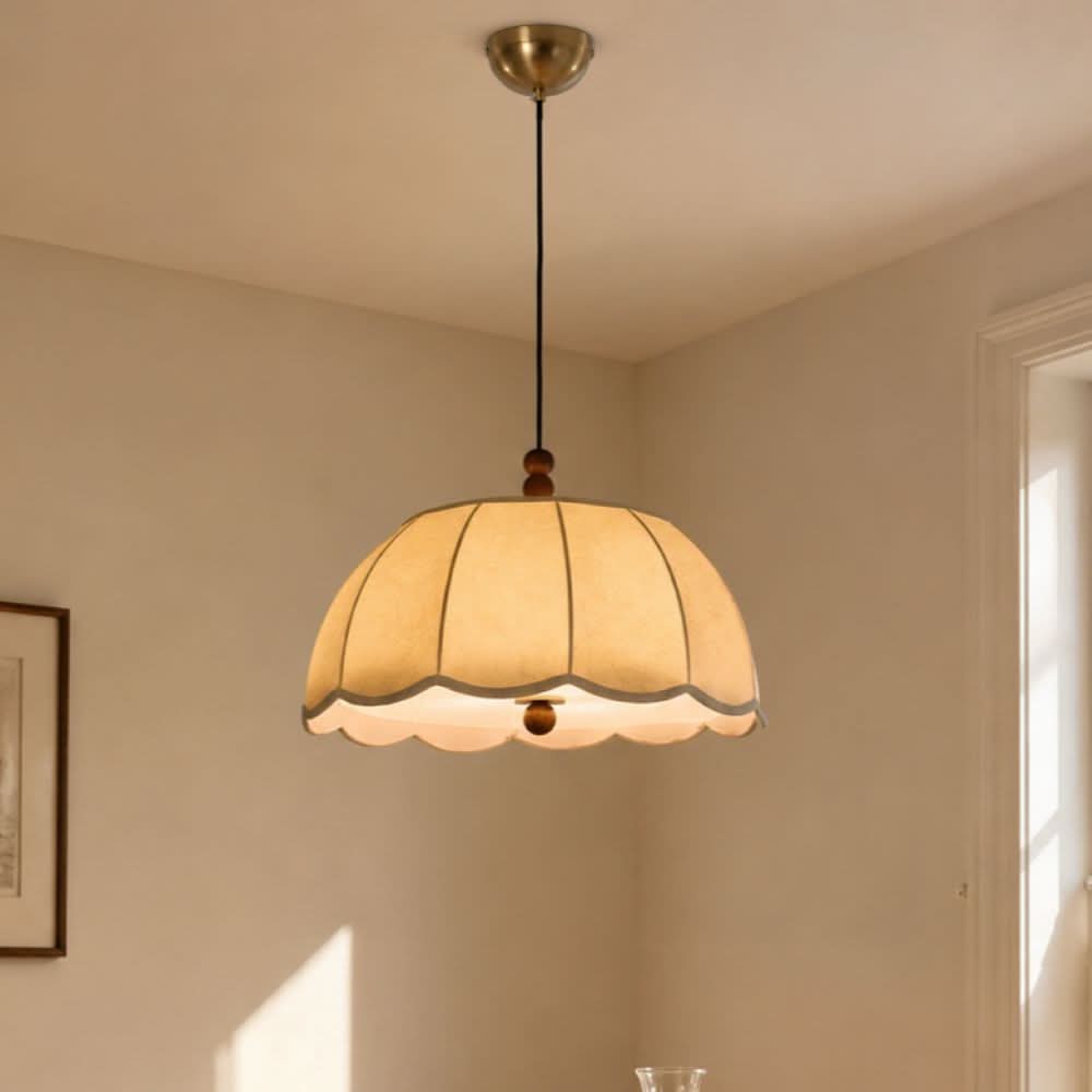 yellow fabric pendant light shown as a clean product view