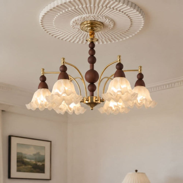 6-light chandelier with white glass shades shown as a clean product view