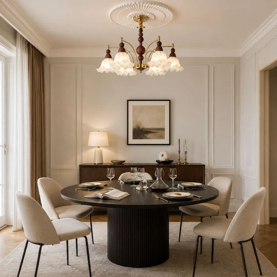 6-light chandelier with white glass shades adding soft light to a bedroom