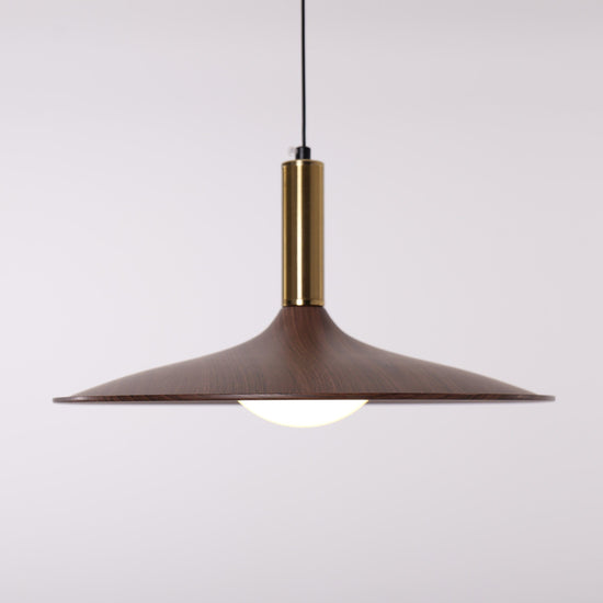 walnut double pendant light hung above a dining table