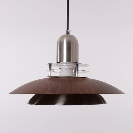 3-light walnut iron bar pendant over a kitchen island