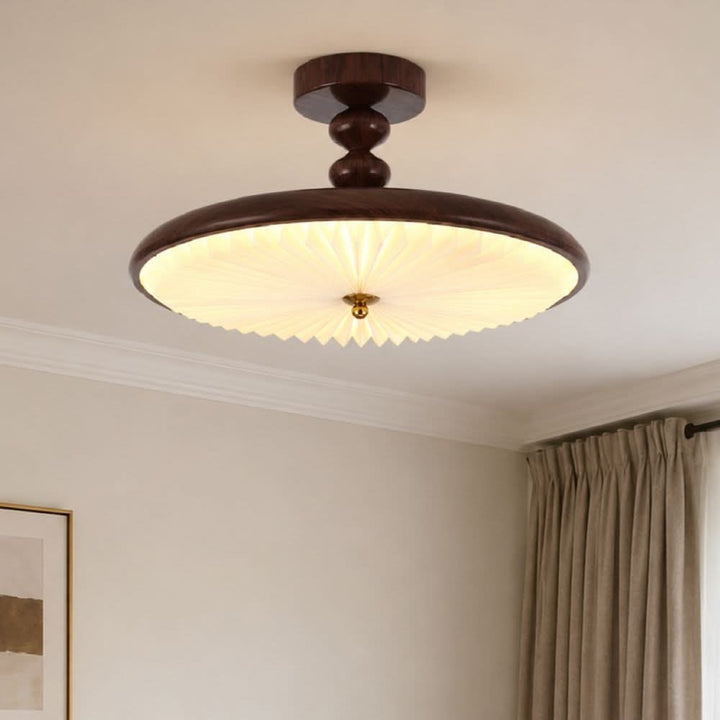 walnut pleated flush ceiling light shown as a clean product view