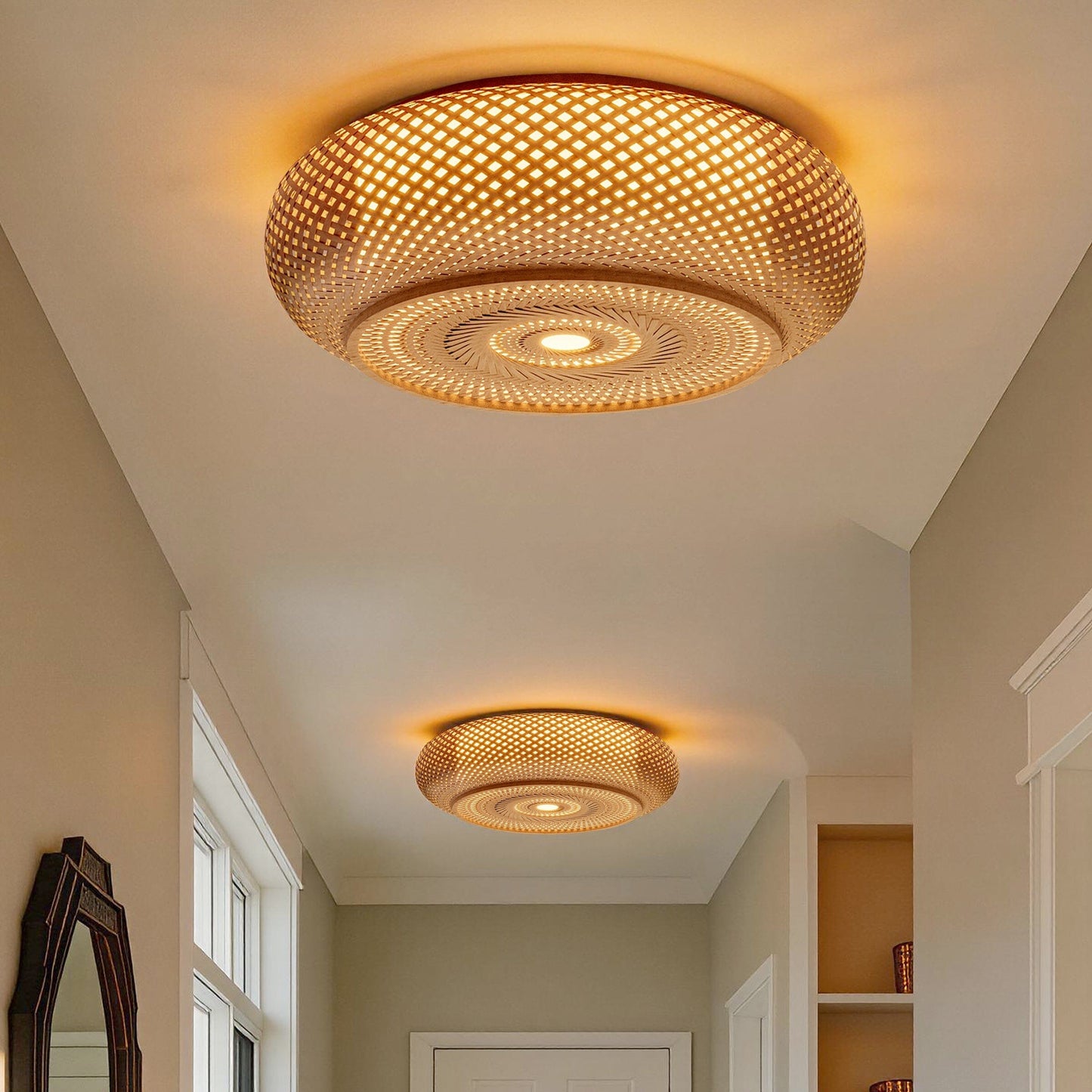 pair of bamboo ceiling lights down a hallway