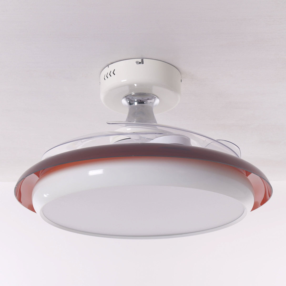36 inch ceiling fan with dimmable LED light cooling a bright bedroom