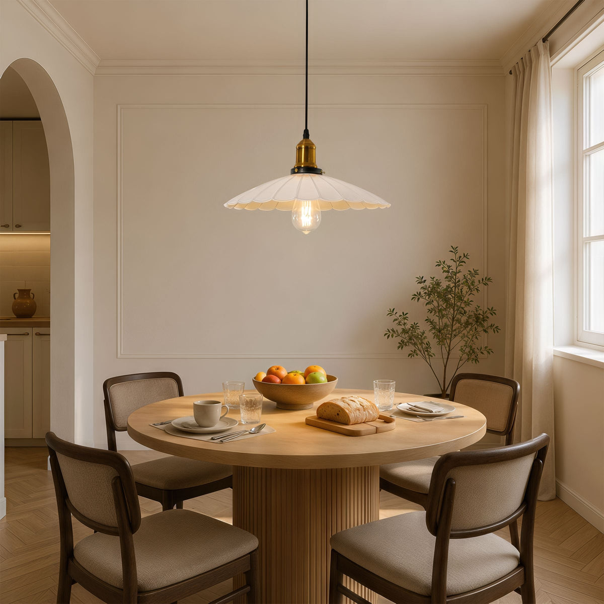 white iron pendant light over a kitchen island
