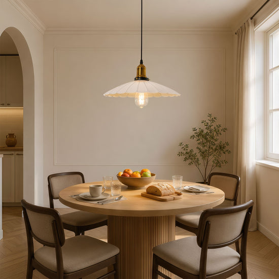 white iron pendant light over a kitchen island