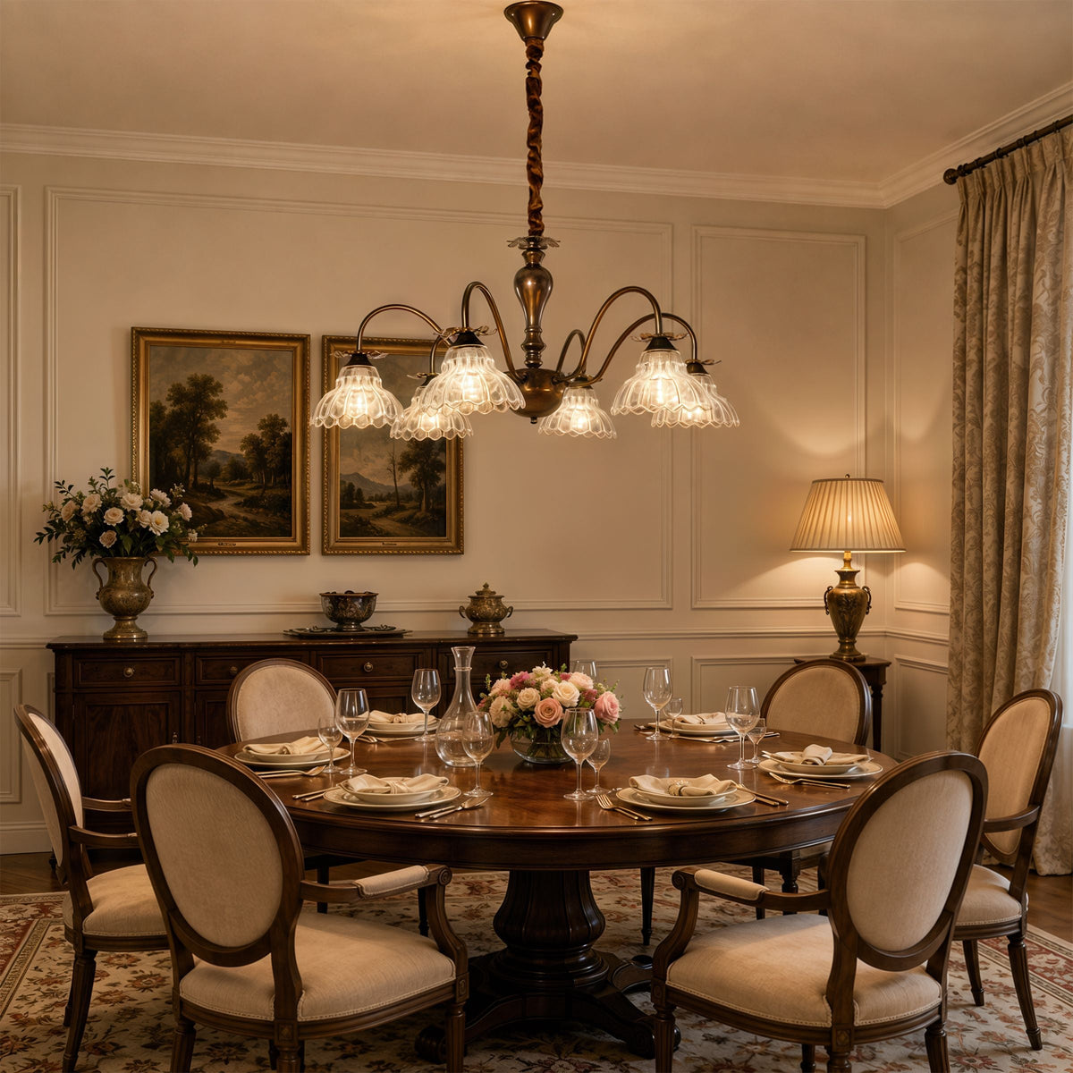 gold 6-light floral glass chandelier glowing above a dining table