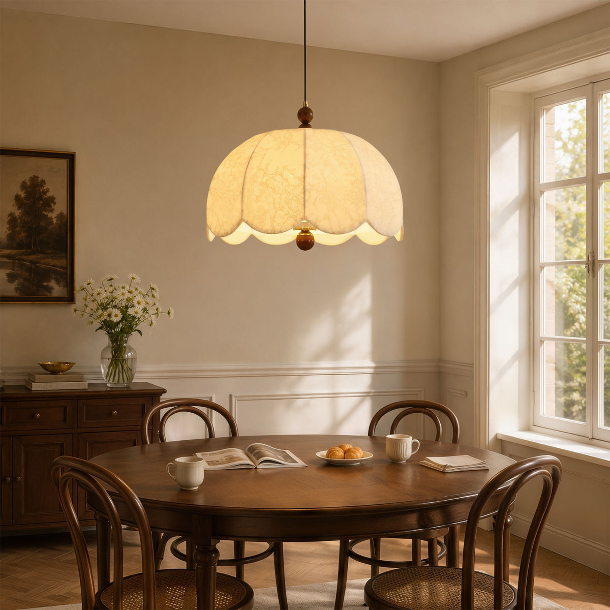 yellow fabric pendant light beside a cosy seating area