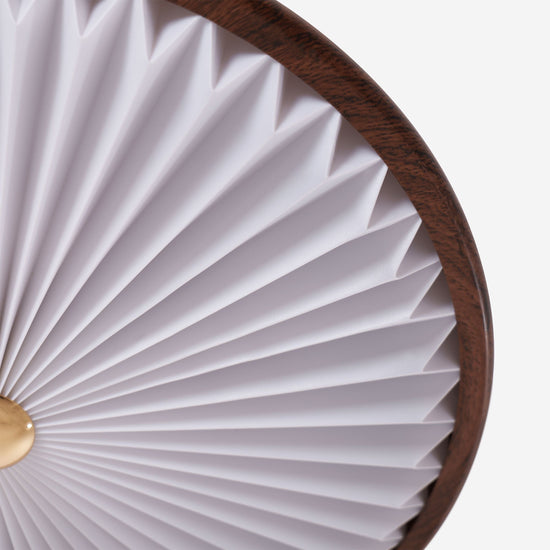 walnut pleated flush ceiling light in a soft neutral room setting
