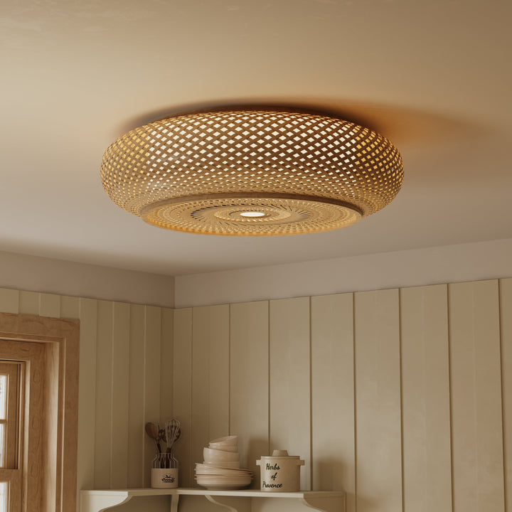 bamboo rattan flush ceiling light glowing in a dining room