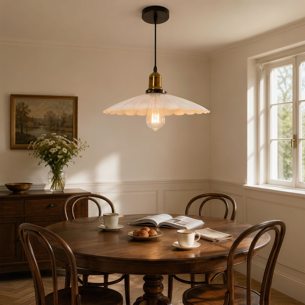 white iron pendant light styled in a calm bedroom