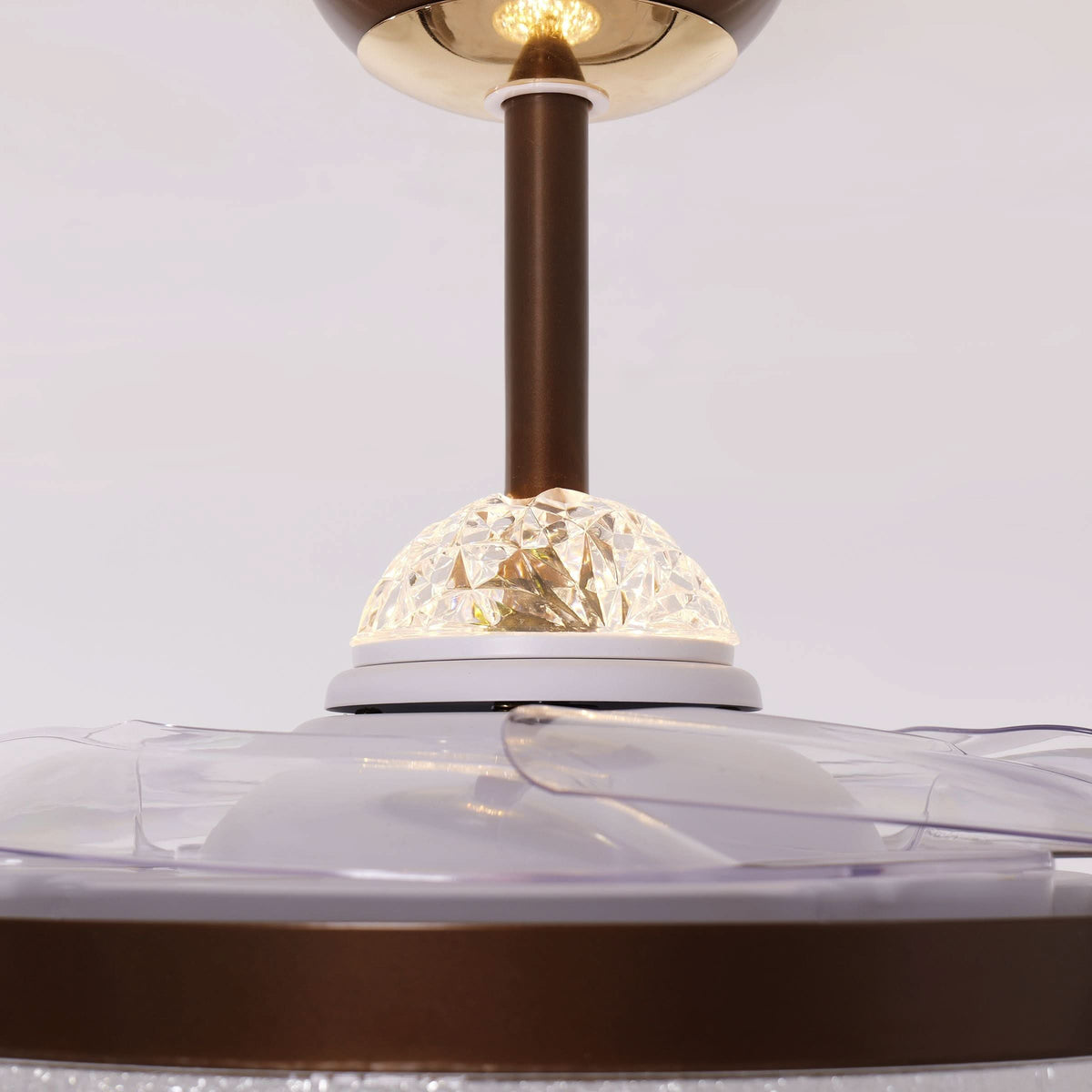 36 inch reversible ceiling fan with LED light cooling a bright bedroom