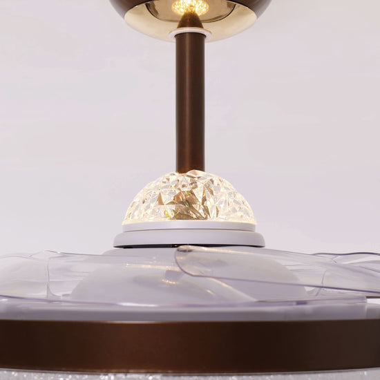 36 inch reversible ceiling fan with LED light cooling a bright bedroom