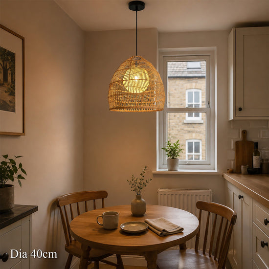 40cm rattan pendant light with inner sphere over a small round dining table