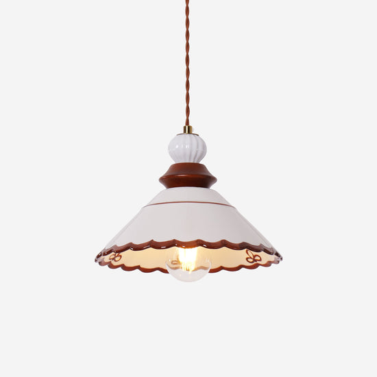 brown ceramic lace pendant light over a kitchen island