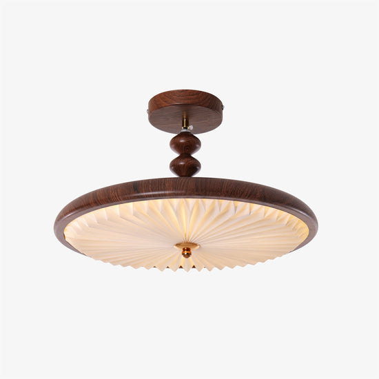 walnut pleated flush ceiling light adding warm light to a bedroom