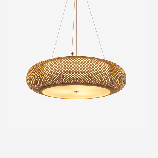 large handwoven bamboo pendant light on a white background