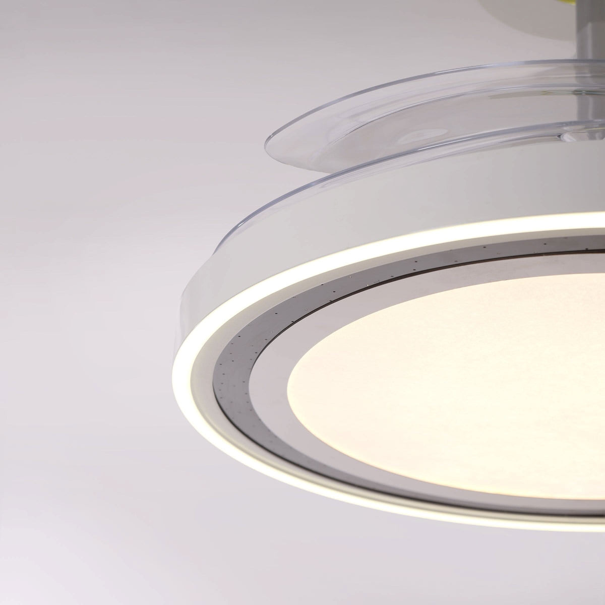 48 inch reversible ceiling fan with LED light cooling a bright bedroom