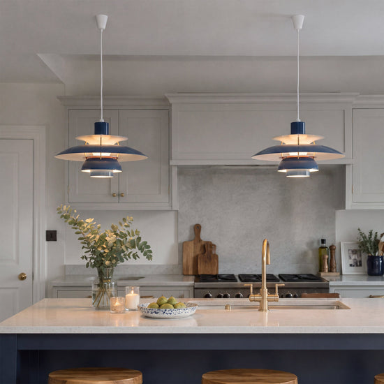 blue layered minimalist pendant light shown as a clean product view