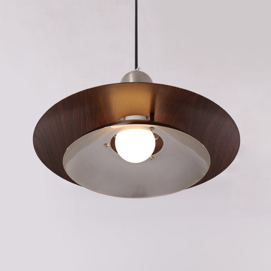 3-light walnut iron bar pendant styled in a calm bedroom