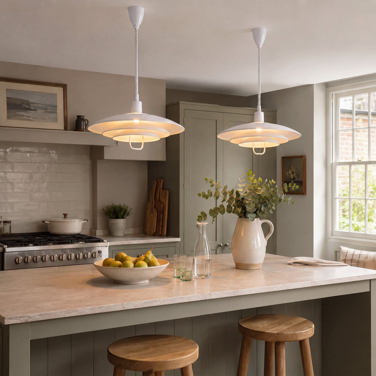 white layered minimalist pendant light in a warm living room