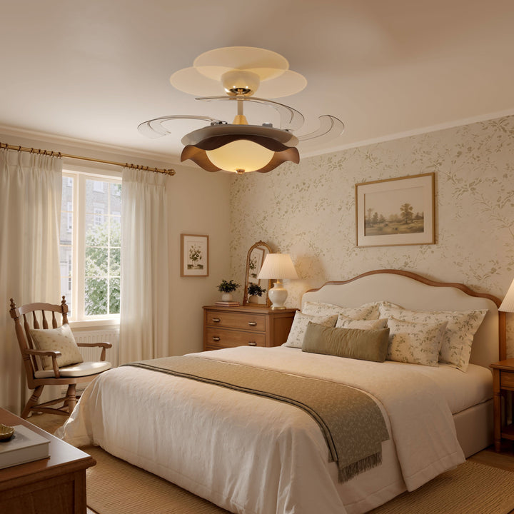 42 inch reversible ceiling fan with LED light cooling a bright bedroom