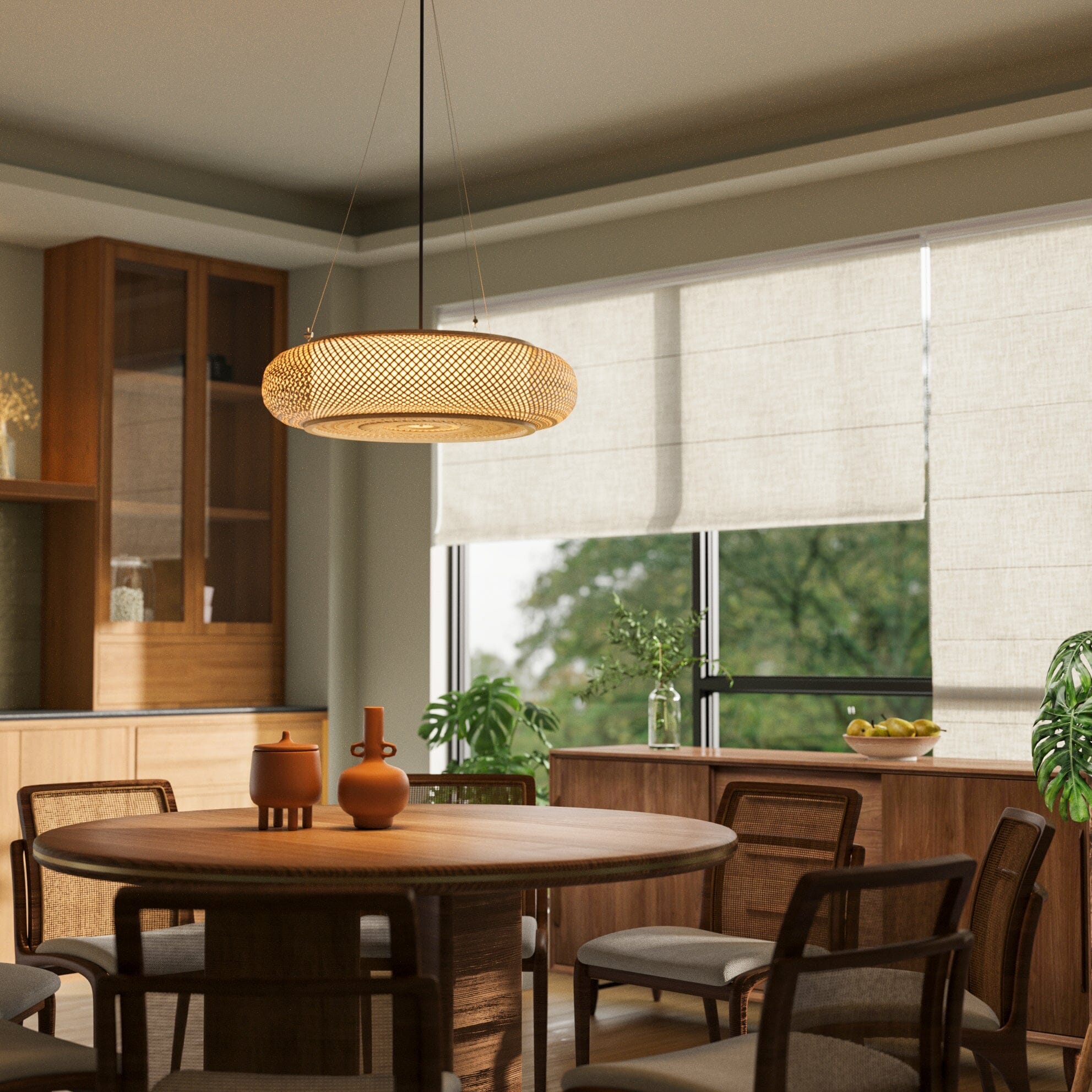 bamboo pendant light above a round dining table