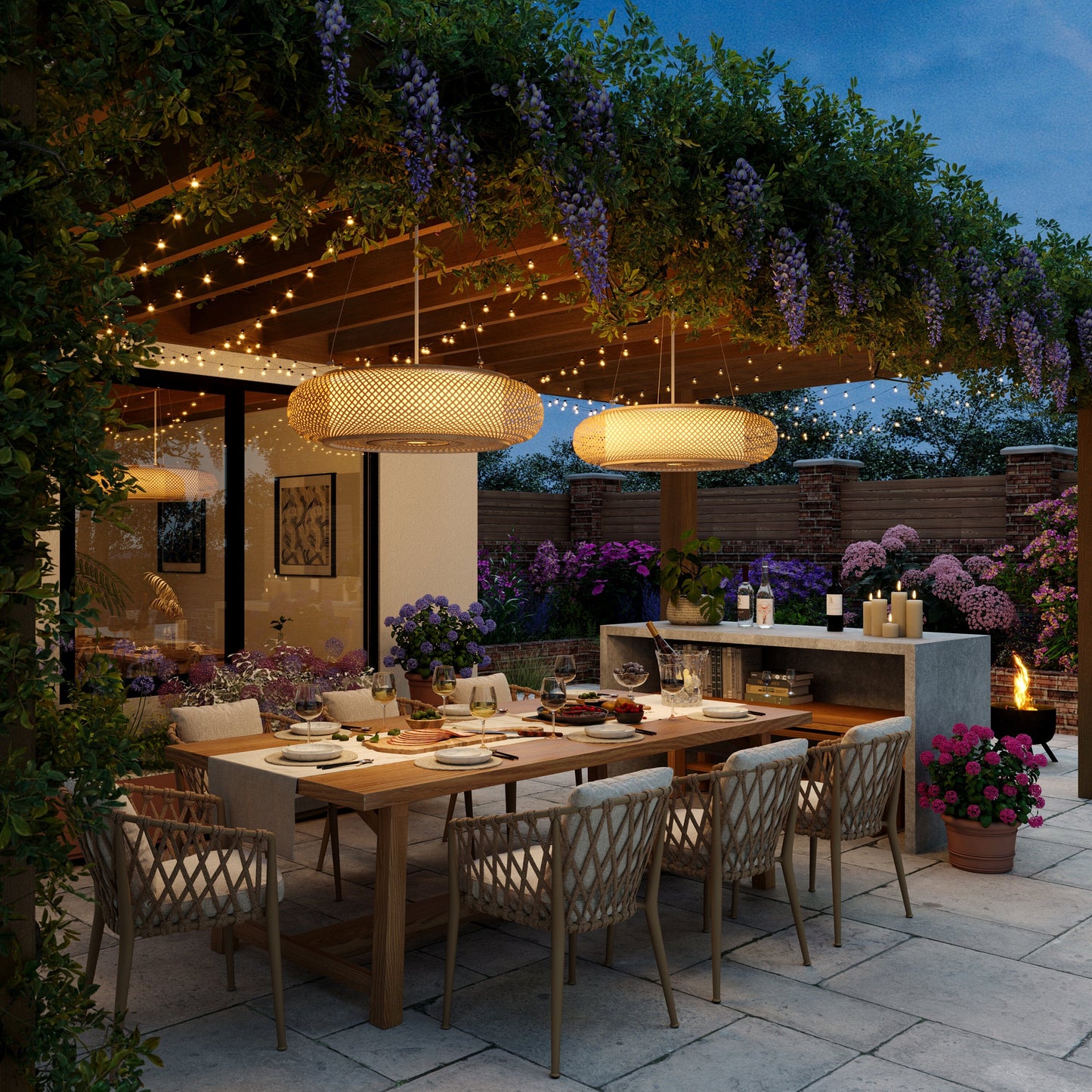 pair of bamboo pendant lights in an evening garden dining area