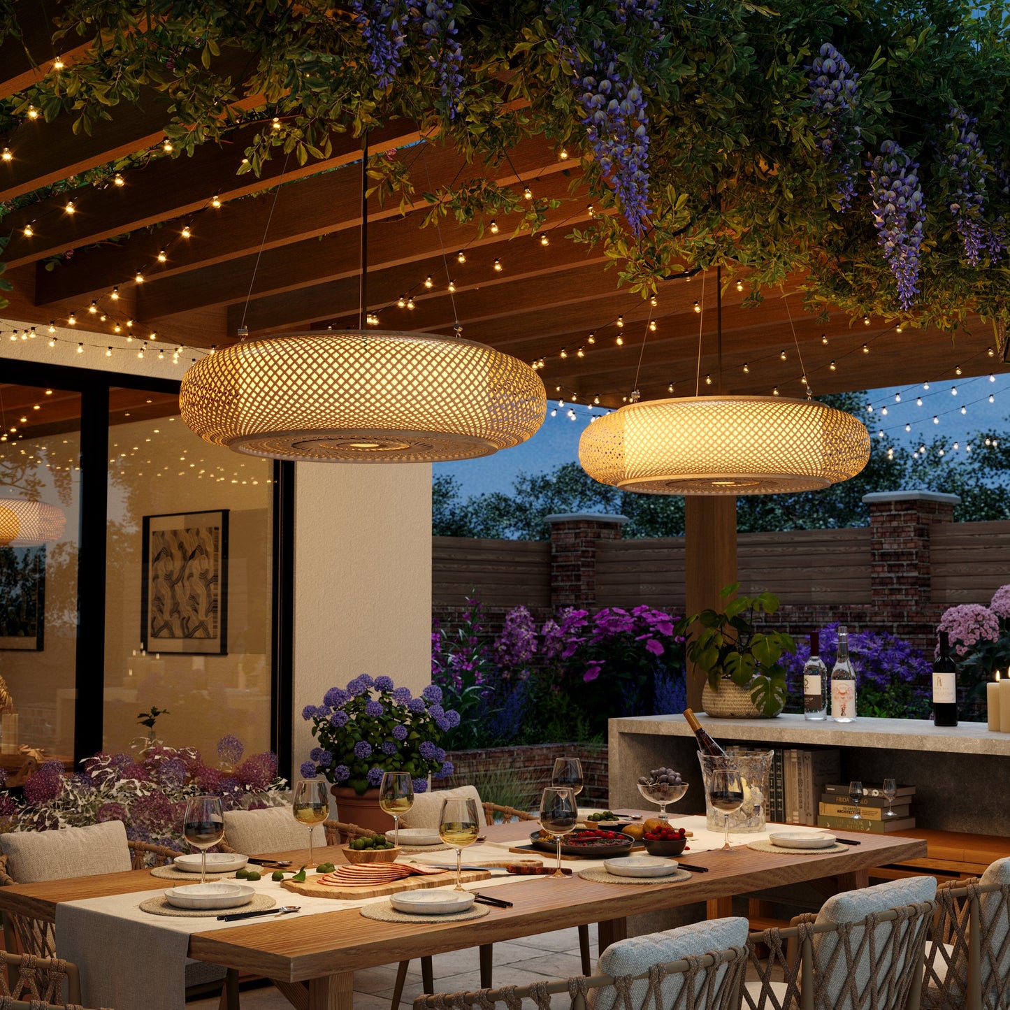 bamboo pendant lights over a patio dining table at night