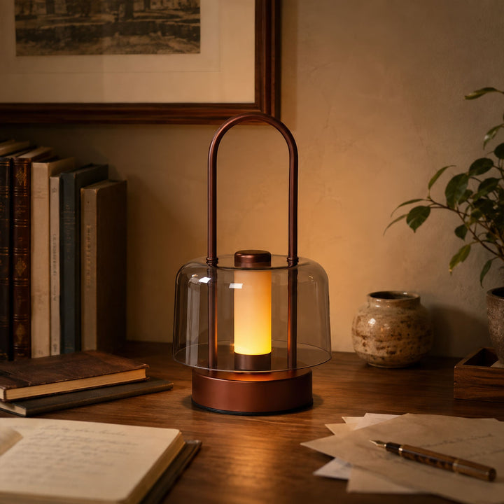 portable lantern-style ambient table lamp adding warm light to a bedroom