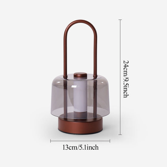 portable lantern-style ambient table lamp with close-up shade and base details
