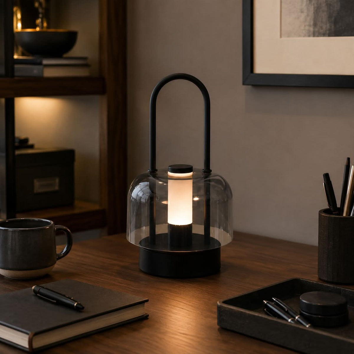 portable lantern-style ambient table lamp glowing on a bedside table