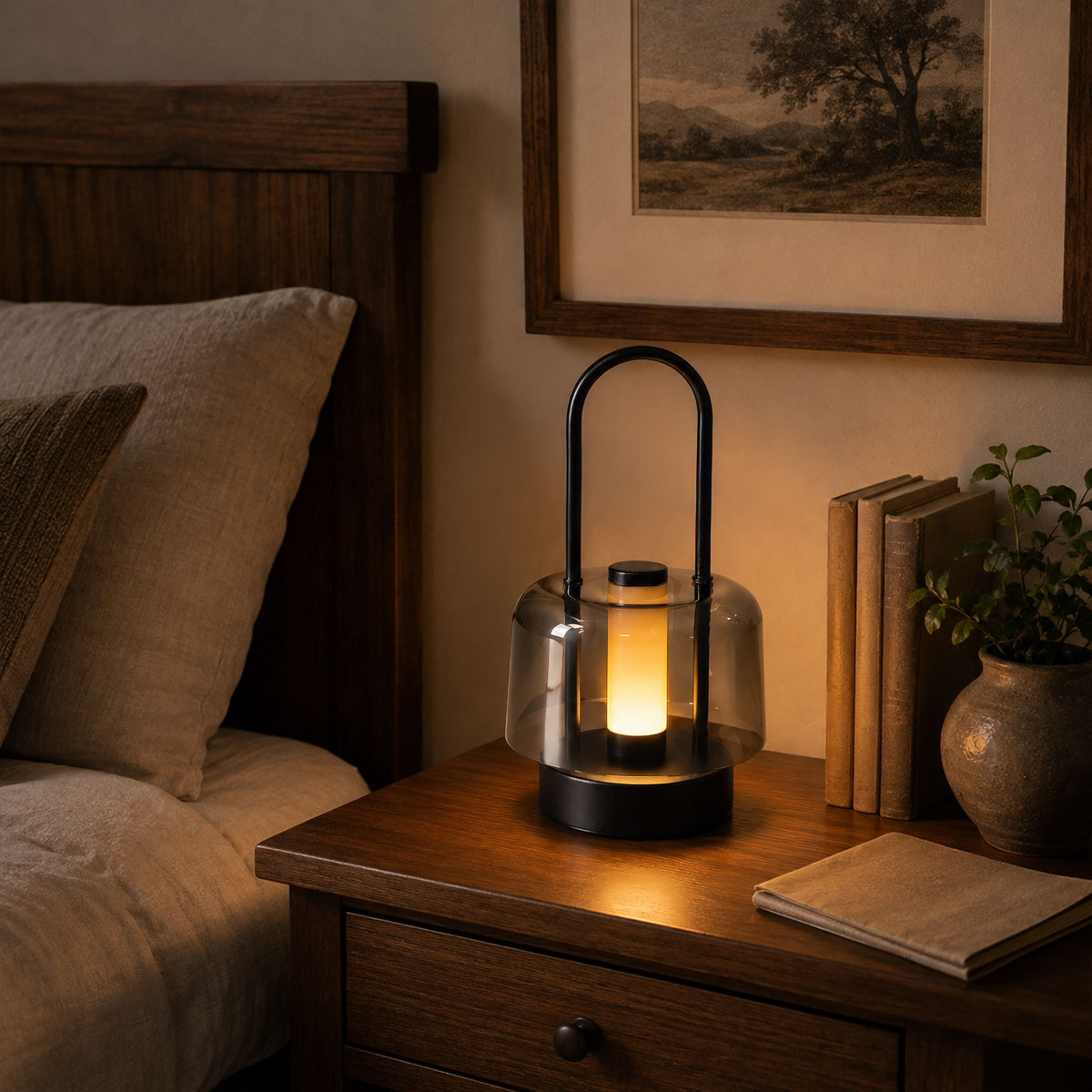 portable lantern-style ambient table lamp beside books and evening decor